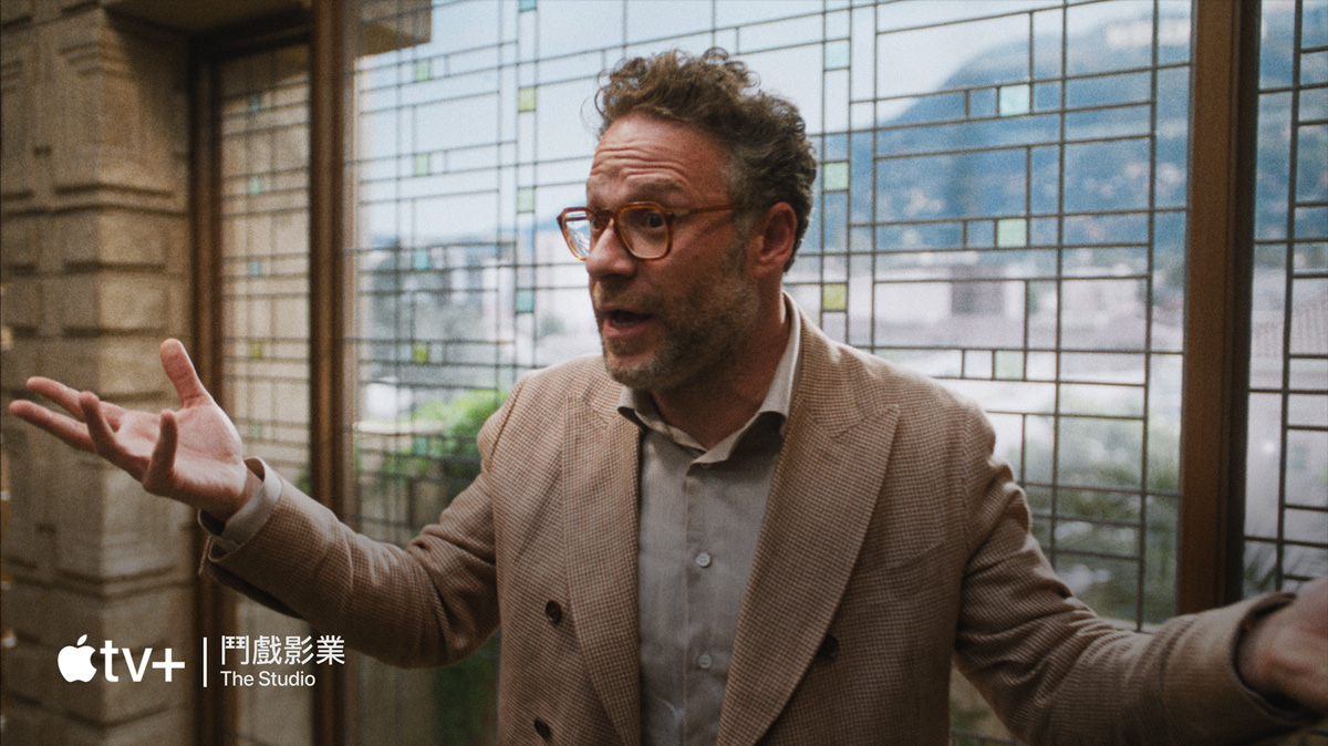 A flatscreen television showing a static image of "The Studio" available on Apple TV+