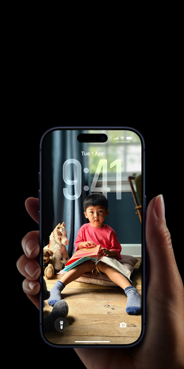 iPhone display, all screen design with iOS 26 Liquid Glass.