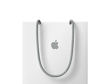 A carrier bag with the Apple logo on the front center