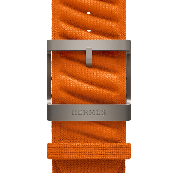 Apple Watch Hermès Ultra 3 En Mer band, orange color, natural color hardware, Hermès logo engraved on buckle